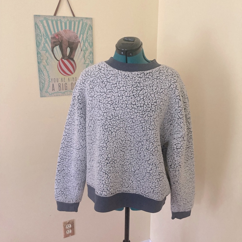 Pale grayish blue shearling textured sweatshirt